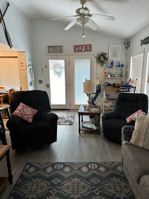 Flat-screen TV, DVD player, video library