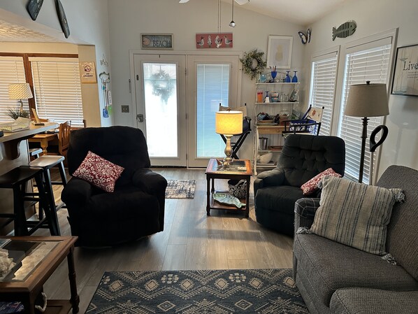 Flat-screen TV, DVD player, video library