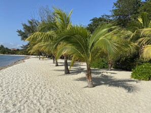 On the beach, sun-loungers, beach towels
