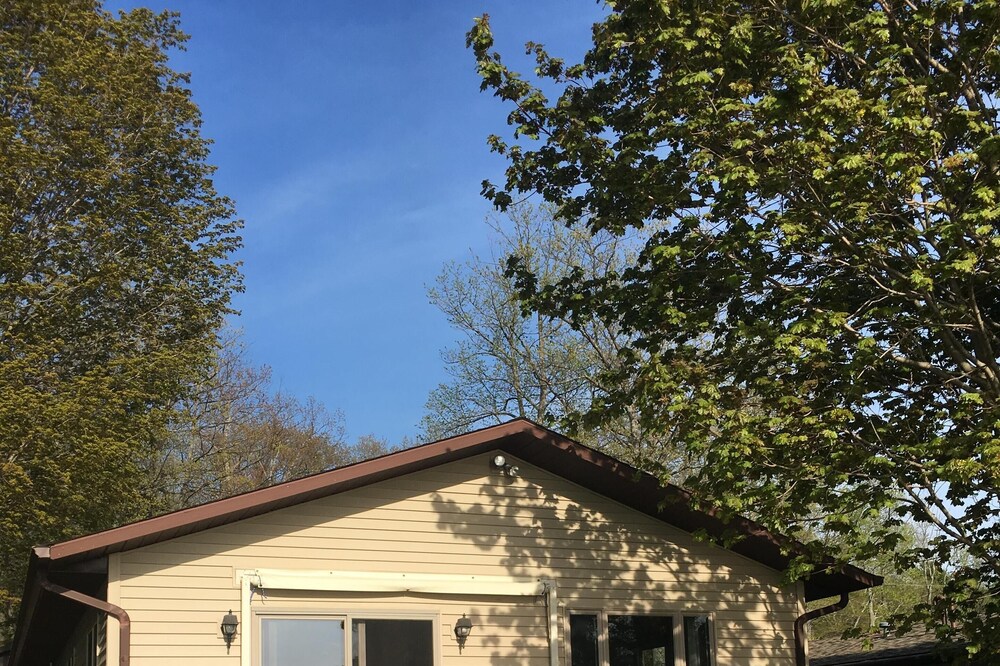 Immaculate Home right on Beautiful Hubbard Lake.