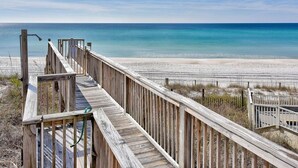 A wooden boardwalk leading to a beach with a clear sky. - Resort Home, 6 Bedrms,4.5bath, pool,Pet friendly, on Gulf,Gated (Panama City Beach)