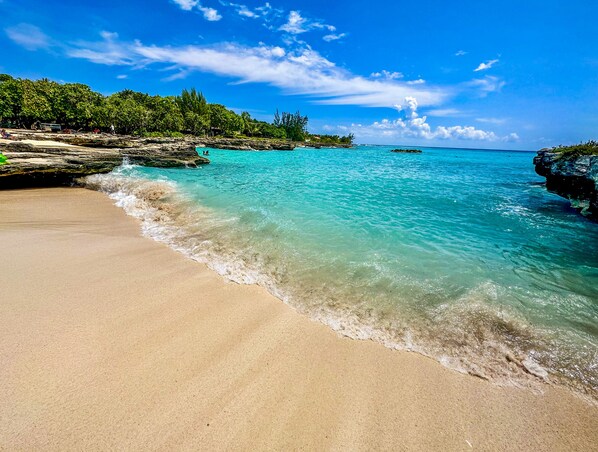 On the beach, sun loungers, beach towels