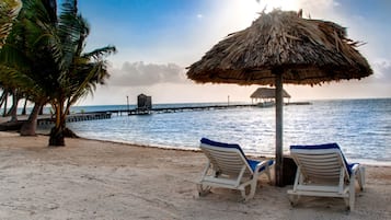 On the beach, sun loungers, beach towels