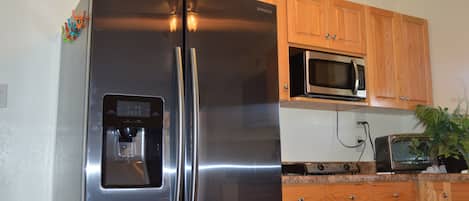 Fridge, microwave, coffee/tea maker, toaster