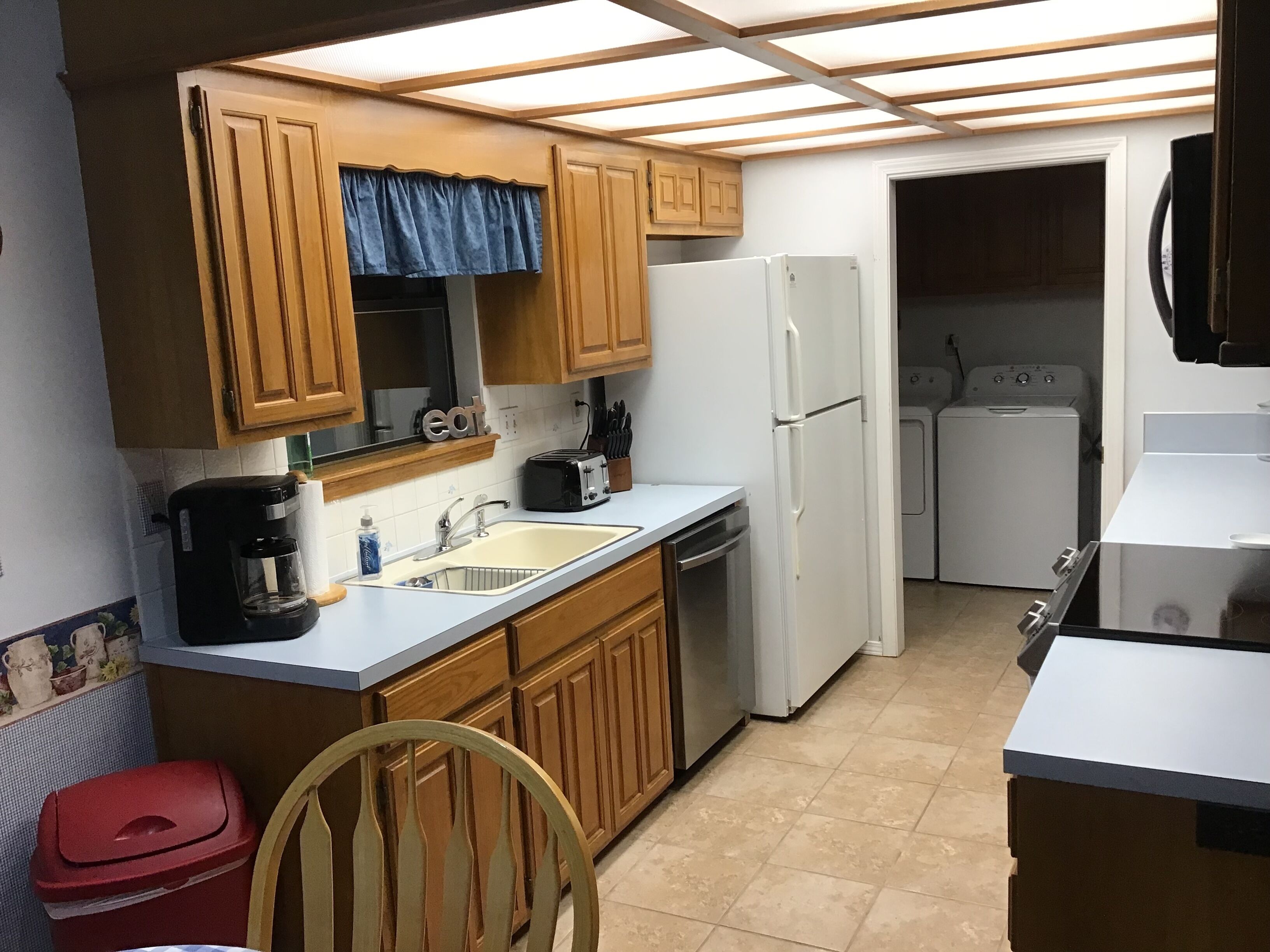 Kitchen on main floor with laundry room