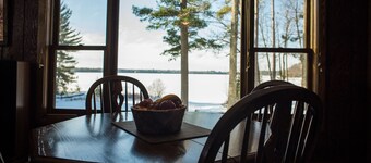 Escape to the Northwoods at this picturesque Sand Lake home
