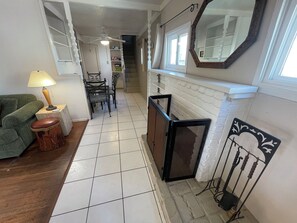 Smart TV, fireplace, books