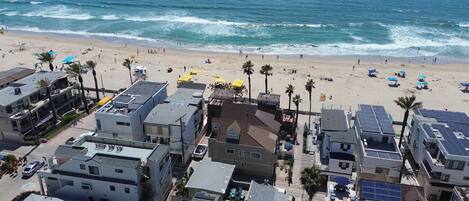On the beach, sun-loungers, beach towels