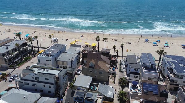On the beach, sun loungers, beach towels