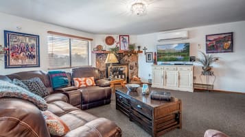 Smart TV, fireplace, books
