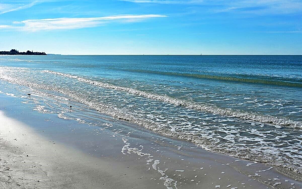 On the beach, sun loungers, beach towels