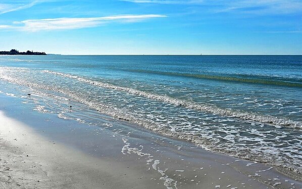 On the beach, sun-loungers, beach towels