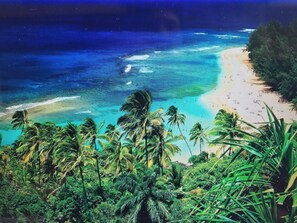 A tropical beach with clear waters and palm trees. - Marriott Kauai Beach Club, Ocean View Studio.  Available Christmas Week! (Lihue)