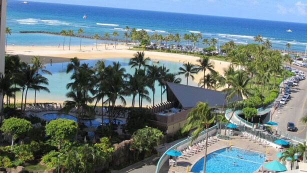 A resort with a pool, beach, and ocean view. - Family friendly unit with fabulous Ocean/Lagoon view  (Honolulu)