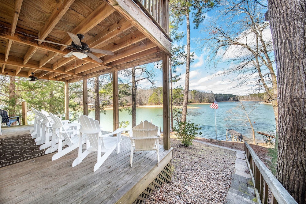 Beautiful waterfront lake house with boat slip & sunset views