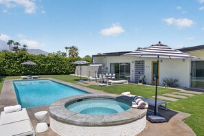 A backyard with a swimming pool, hot tub, and outdoor seating area. - PS Chill: Meticulous Mid-Century Features Modern Comfort and Views! (Palm Springs)