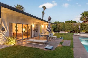 A modern house with a pool, outdoor seating, and a well-maintained garden. - PS Chill: Meticulous Mid-Century Features Modern Comfort and Views! (Palm Springs)