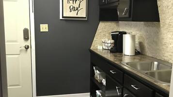 Fridge, microwave, coffee/tea maker, toaster
