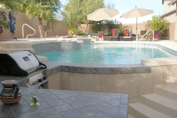 view of pool from swim up bar