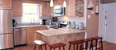 Coffee/tea maker, fridge, microwave, oven