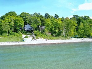 On the beach, sun-loungers