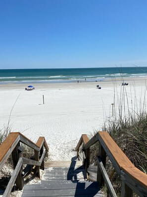On the beach, sun loungers, beach towels