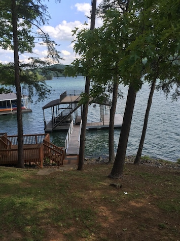 View of double deck dock from home. Slight slope.