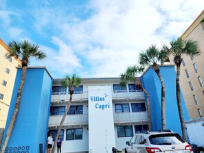 Enjoy a tropical view from the second-floor balcony overlooking the surrounding area.