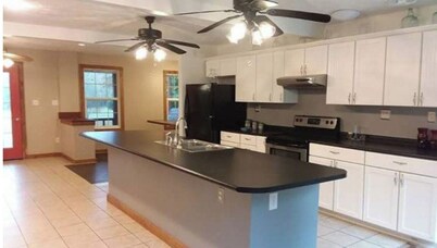 The Bunkhouse A two story rustic cabin 3BR 2BA