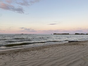 On the beach, sun-loungers, beach towels