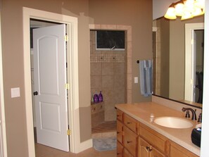 Combined shower/tub, towels, soap, toilet paper