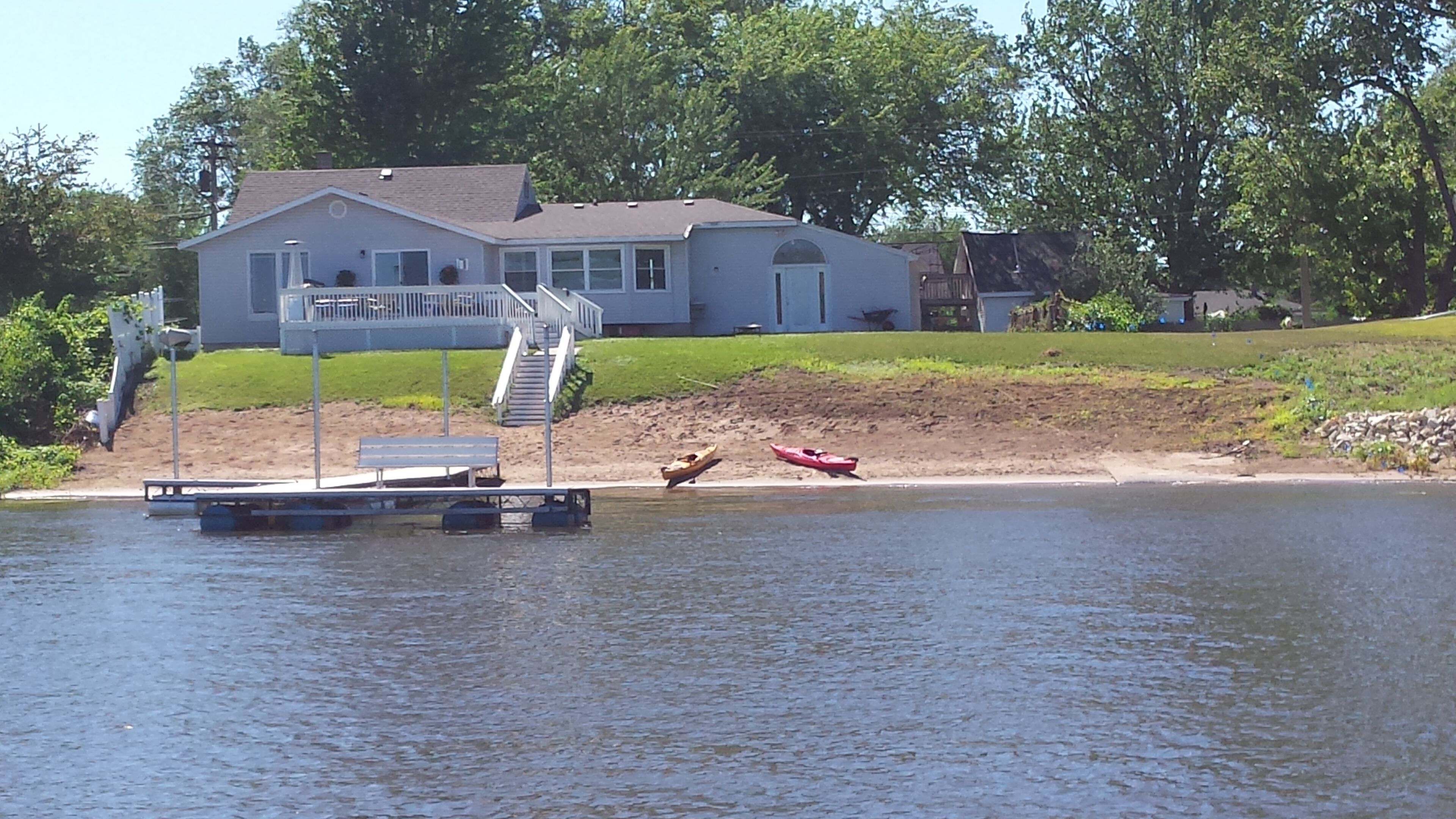 Beautiful Riverside Beach House with private dock/beach frontage