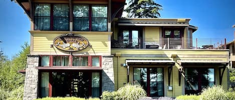 A multi-story building with a sign indicating 'Indian Island Suites.'