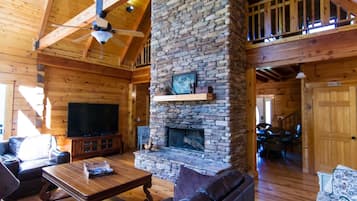 Smart TV, fireplace, DVD player, books