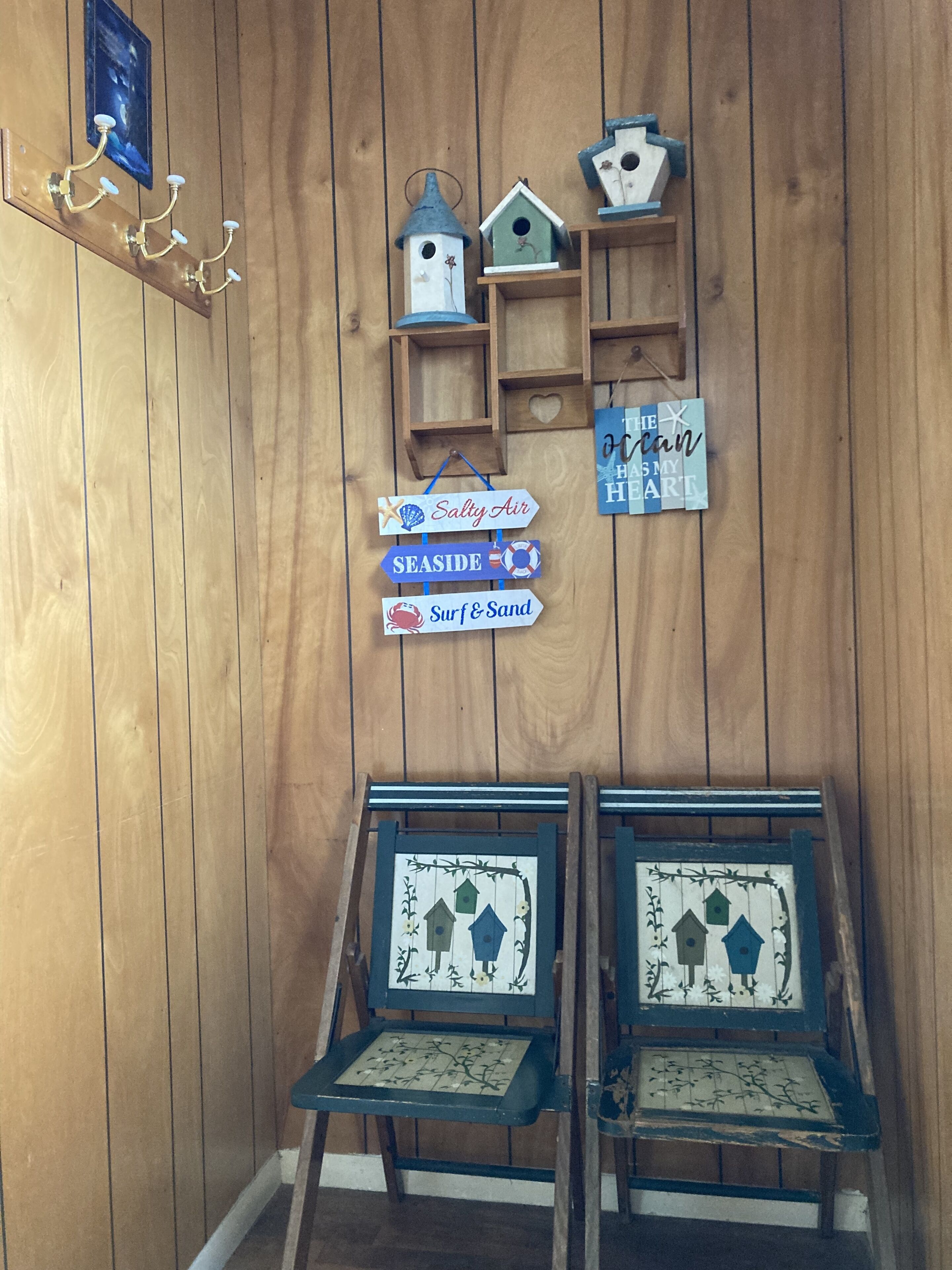 Entry way with seats to take off shoes and hang up Jackets