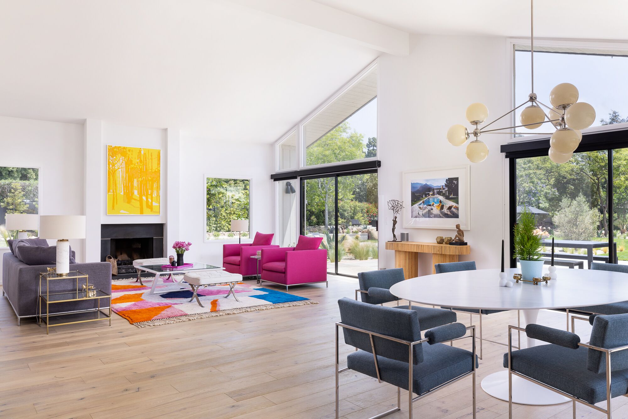 Main living area off of kitchen out to pool and dining. Designer furniture. 