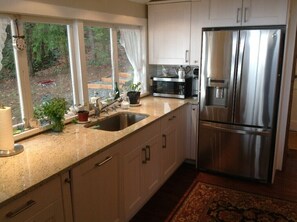 Fridge, microwave, oven, stovetop - South Beach Cozy Cottage - Waterfront Perfection (Bainbridge Island)