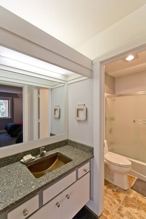 Combined shower/tub, hair dryer, towels, soap