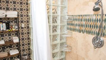 Combined shower/tub, hair dryer, towels, soap