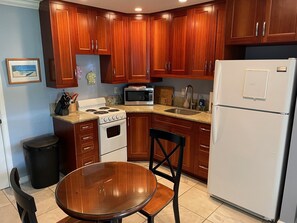 Fridge, microwave, coffee/tea maker, toaster