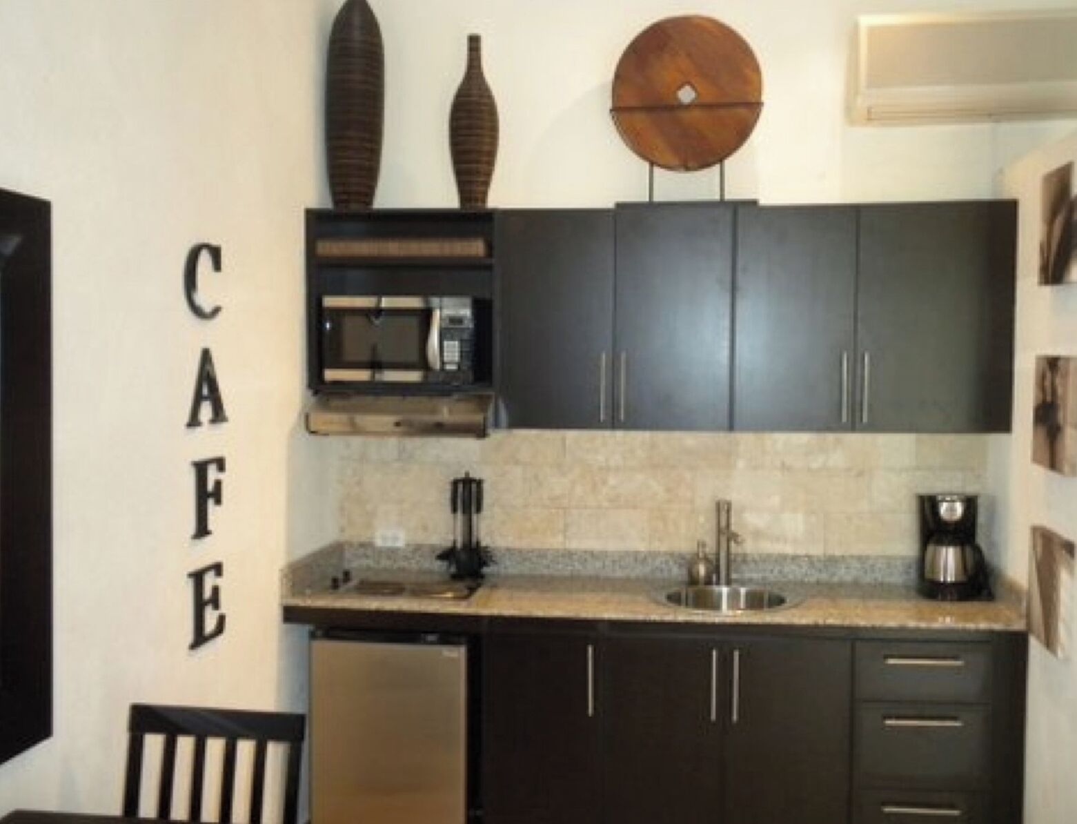 Fridge, microwave, stovetop, coffee/tea maker