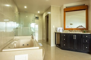 Bathtub, hair dryer, towels, soap
