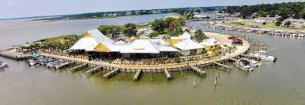 Enjoy waterfront views and access to recreational activities from this multi-level communal area.