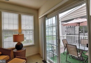 Enjoy a balcony with outdoor seating and a view of the surrounding neighborhood.