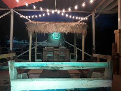 Enchanting Spacious Beach House With Hot Tub, Game Room, Tiki Bar & Fishing Dock