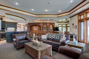 Smart TV, fireplace, DVD player, foosball