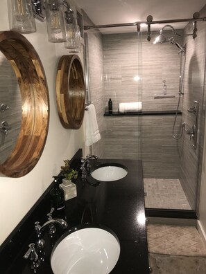 Bathtub, hair dryer, towels, soap