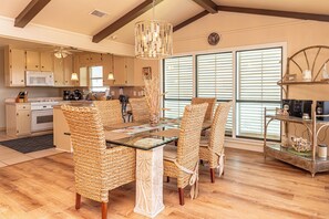 Enjoy a casual yet elegant dining experience in this well-appointed kitchen and dining area.
