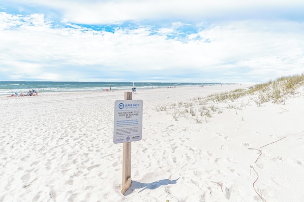 Leave your mark on this expansive beach, where footprints tell the story of a day well-spent.