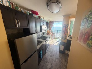 Fridge, microwave, coffee/tea maker, toaster